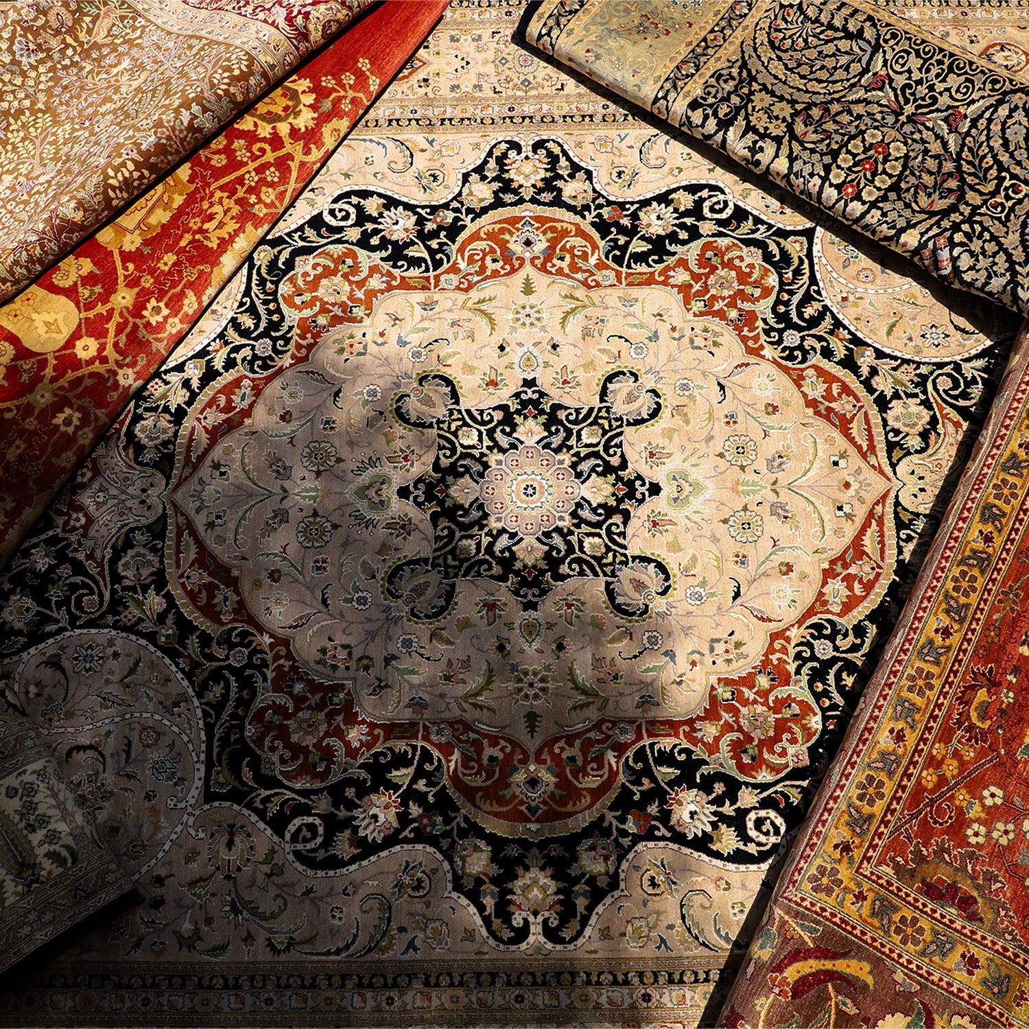 Handcrafted traditional rug from Mehar Carpets' collection, featuring intricate floral and medallion patterns in deep red, navy, and ivory tones, made from premium wool for a luxurious look.